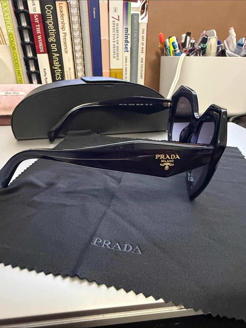Prada Dark Blue Sunglasses with Gold Logo Accent - Picture 8 of 12